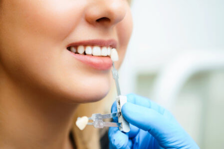 Forest Hills Dentistry discusses the differences between implants and dentures.