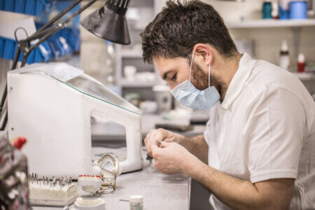 Dental technician at his workplace